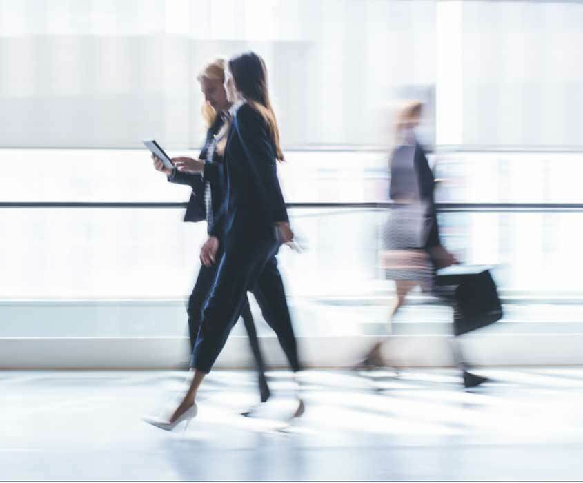 Blurred image of people walking